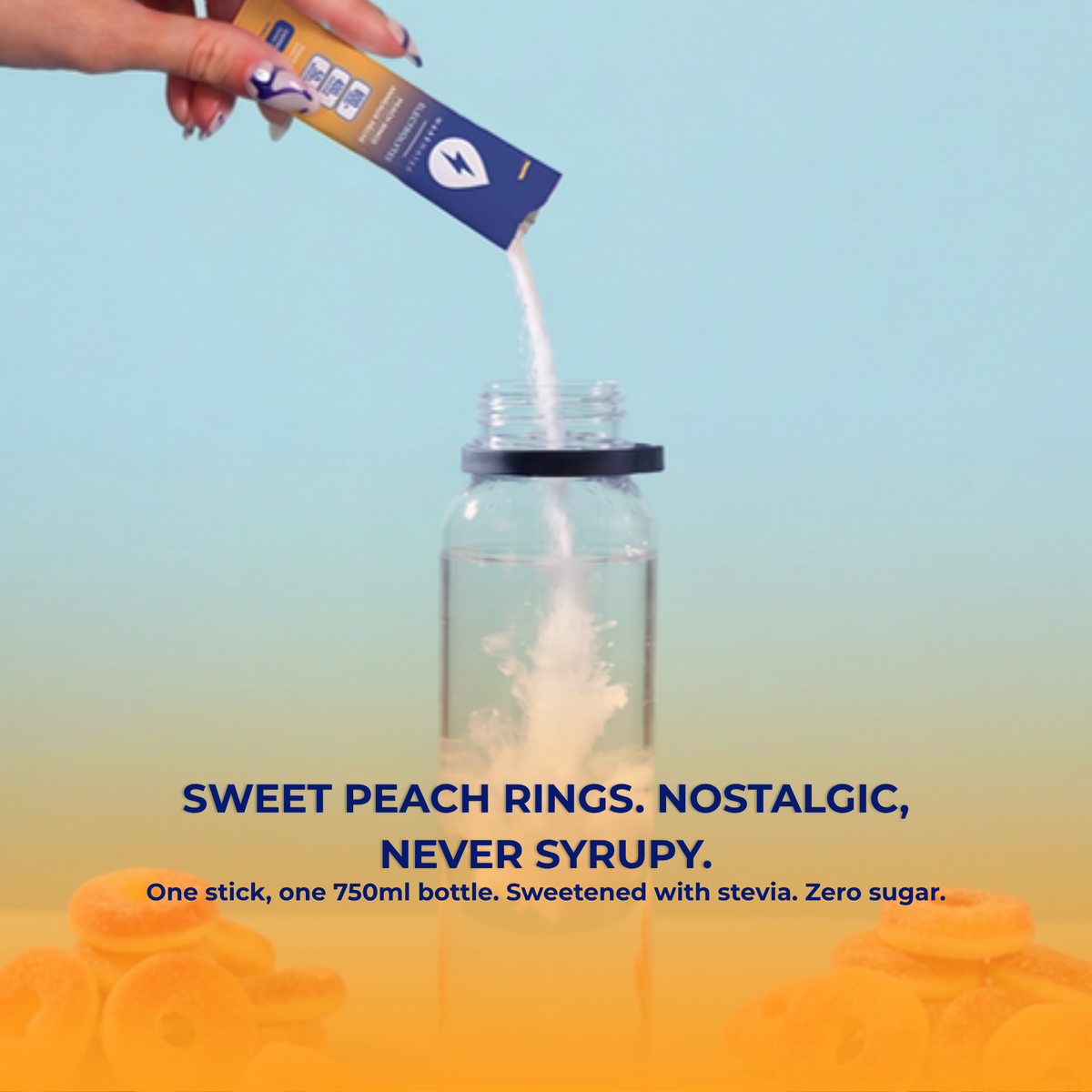 Peach Rings stick pouring into a water bottle