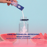 Watermelon stick pouring into a water bottle